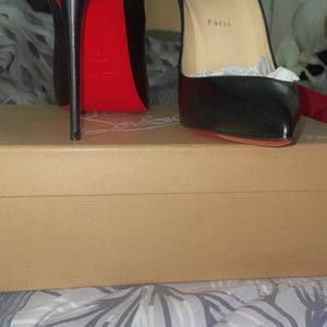 Never worn Christian Louboutin Heels